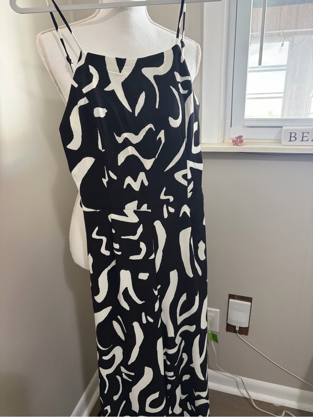 Black & White Abstract Print jumpsuit with partial open back.